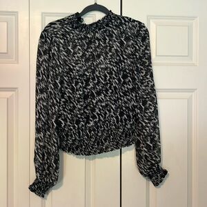 express blouse in size medium worn a few times but good condition